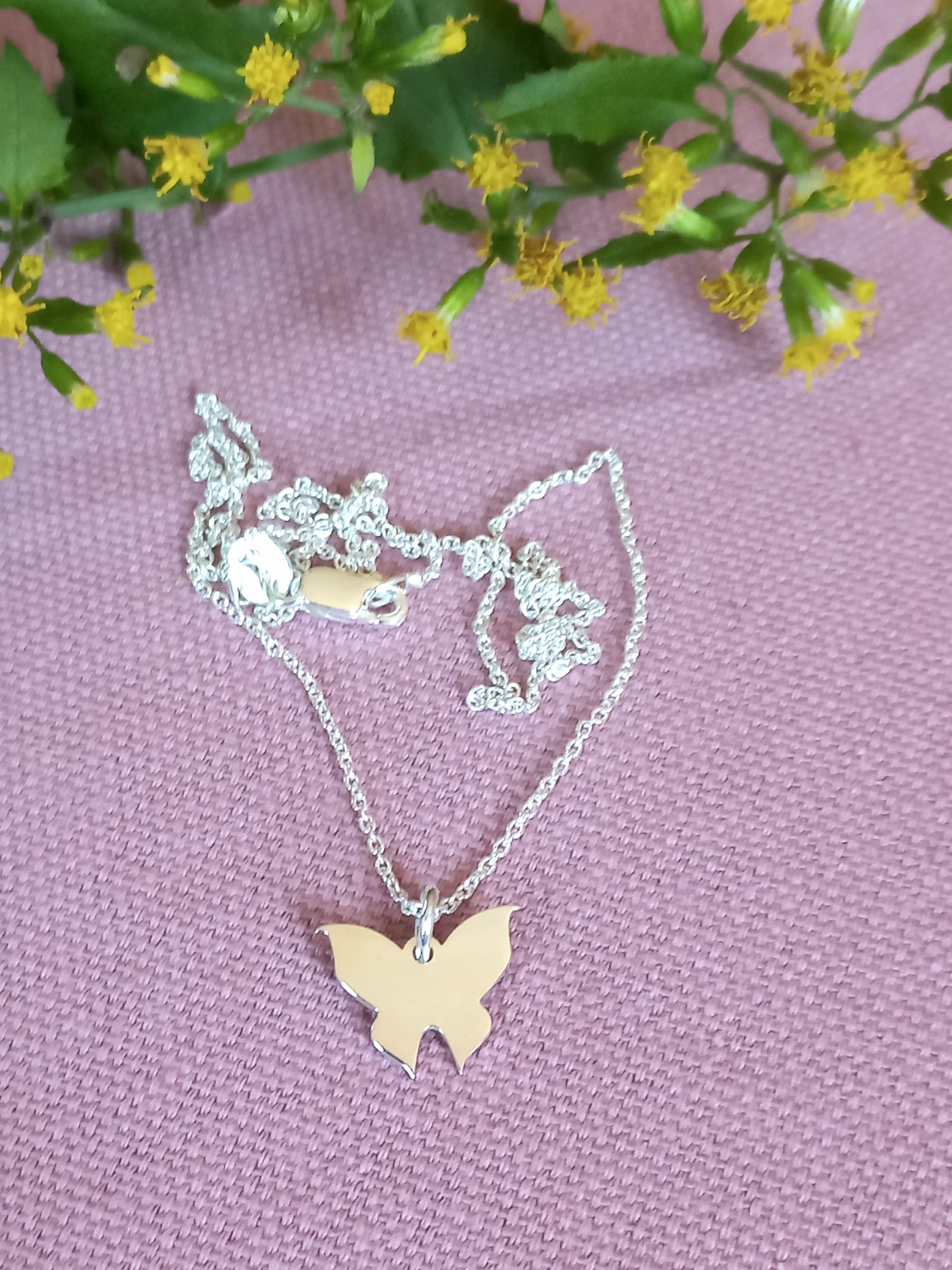 Butterfly cutout pendant