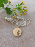 Free form leaf engraved disc pendant
