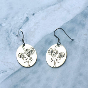 The King protea is truly the king of the Cape floral kingdom and is also recognised as the national flower of South Africa.  These earrings can be manufactured in silver, copper, brass or 9 ct gold.  Disc size: 20 x 14 mm  All earrings are made with silver hooks, for gold hooks with the gold discs (only yellow or white gold) please inquire about the price.
