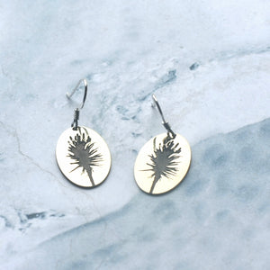  The image of the Aloe reminds of long drives through the Karoo and Cape coastal regions during winter and early spring, breaking the dry surroundings with images of fiery rockets shooting up in the mind of many children.  These earrings can be manufactured in silver, copper, brass or 9ct gold.  Disc size: 18 x 12 mm  All earrings are made with silver hooks, for gold hooks with the gold discs (only yellow or white gold) please inquire about the price.