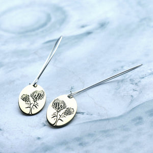 The King protea is truly the king of the Cape floral kingdom and is also recognised as the national flower of South Africa.  These earrings can be manufactured in silver, copper, brass or 9 ct gold.  Disc size: 20 x 14 mm  All earrings are made with silver hooks, for gold hooks with the gold discs (only yellow or white gold) please inquire about the price.