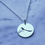The long tail of the male sugarbird dancing in the sun as it flies from protea to protea can only be describes as enchanting.  This pendant can be manufactured in silver, copper, brass or 9ct gold.  Pendant size: 18 mm
