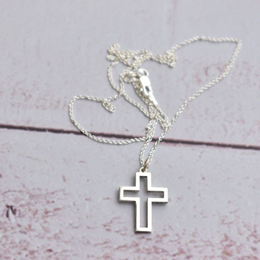 Outlined cross pendant
