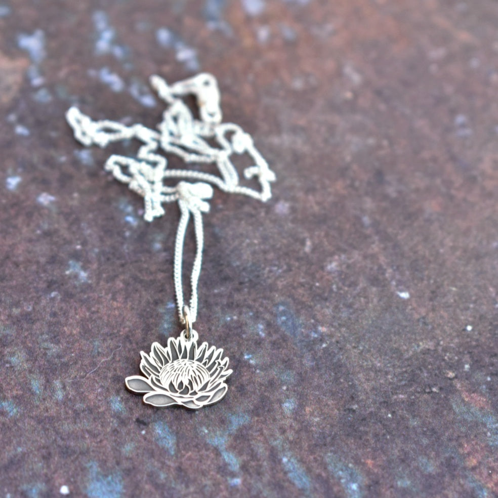 Protea cutout pendant