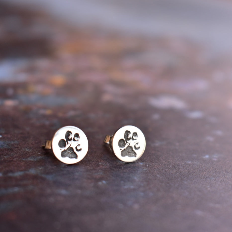 Paw print engraved disc studs