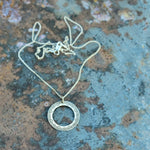 Engraved ring pendant