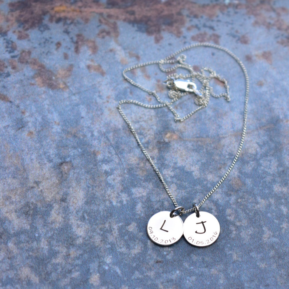 Engraved letter & date disc pendant