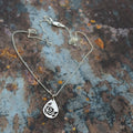 Rose filigree teardrop pendant