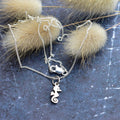 Seahorse cutout pendant