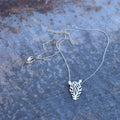 Zebra's head pendant