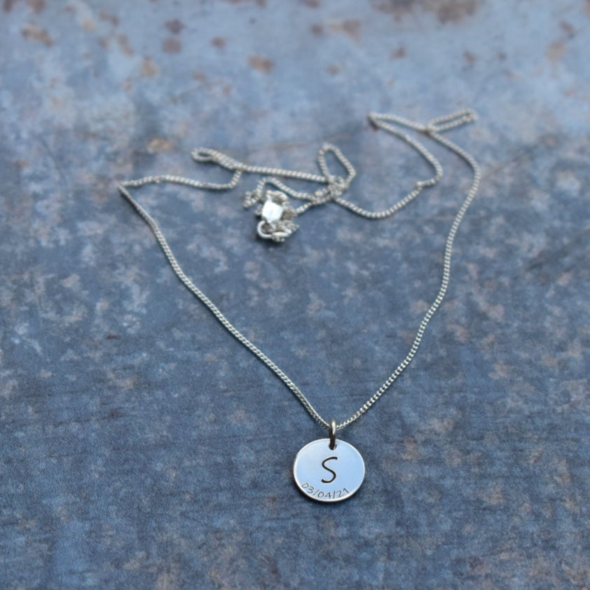 Engraved letter & date disc pendant