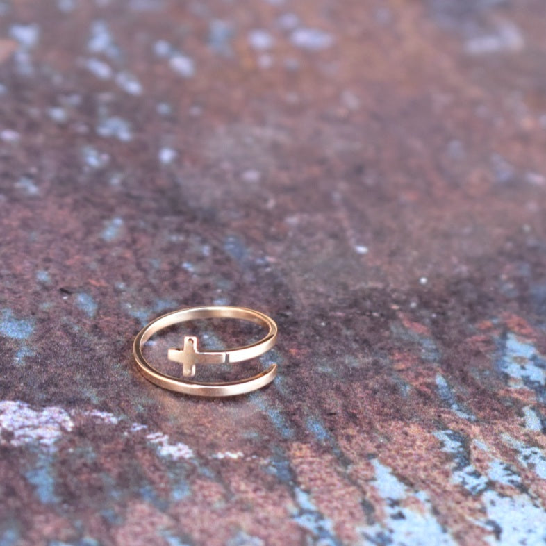 Cross fold-over ring
